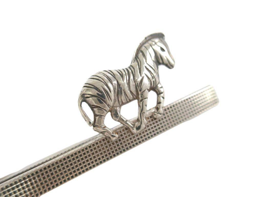 Hermes Vintage Men's Silver Africa Zebra Suite Tie Clip in Storage Case 

Silver 
Clip on
Made in France
Width 0.75