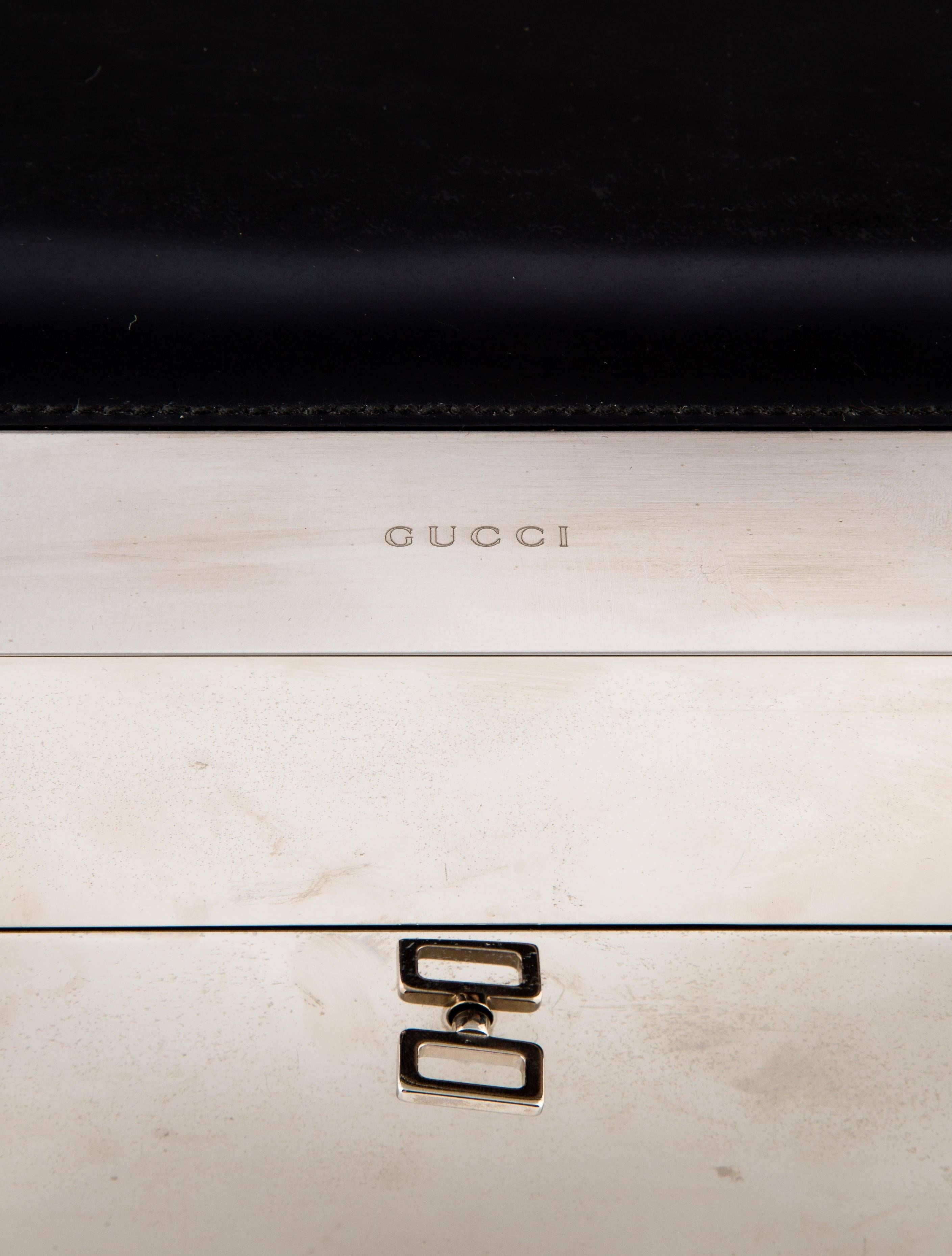 CURATOR'S NOTES

Gucci Leather Stainless Steel Men's Storage Table Desk Cigar Humidor Case Box 

Leather
Silver tone hardware
Cedar interior
Temperature gauge
Suede underside
Twist closure
Made in Italy
Measures 14.5" W x 5" H x 9" D