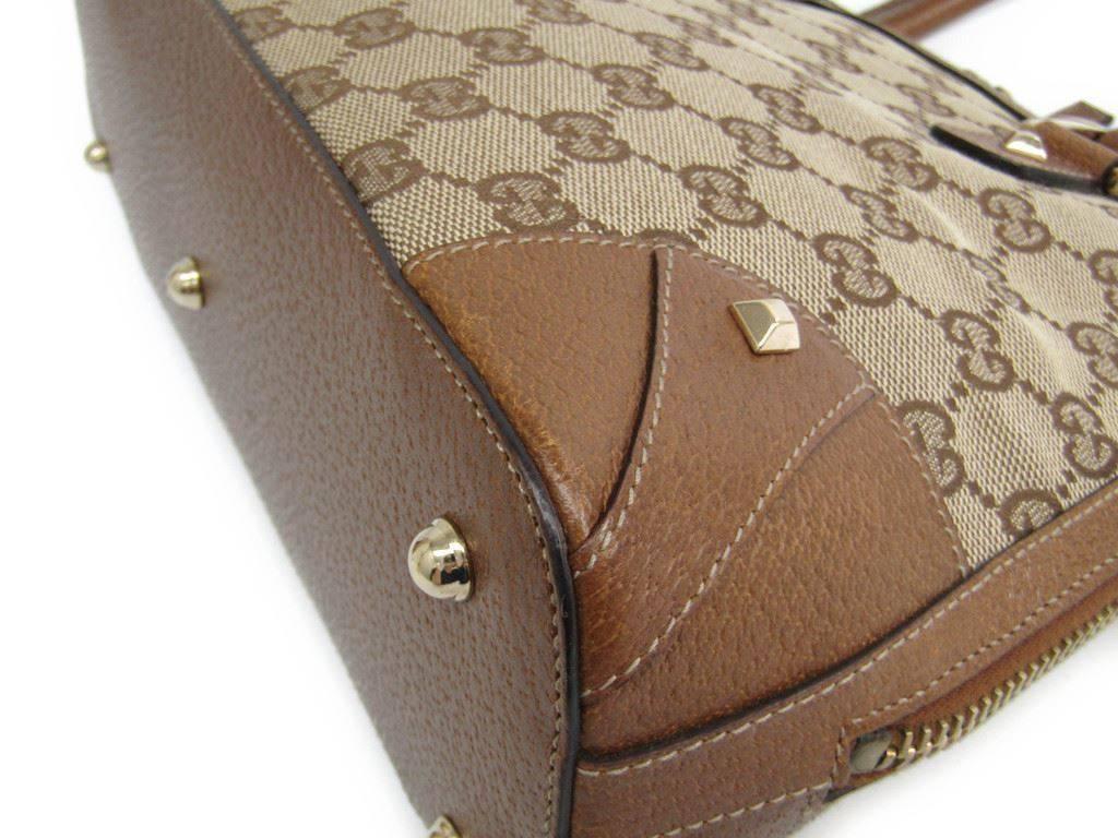Women's Gucci Monogram Canvas GG Leather Trim Medium Gold Top Handle Satchel Bag