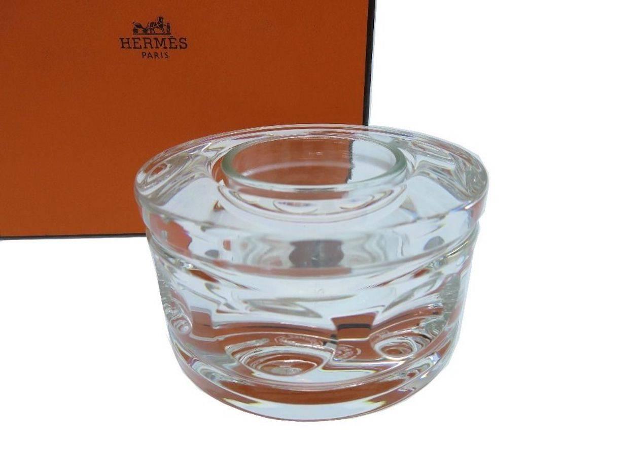 CURATOR'S NOTES

Hermes Crystal Votive 2 in 1 Table Desk Home Candle Holder in Box  

Crystal
Signed Hermes Paris
Measures 3.25" W x 2" H 
Includes original Hermes box