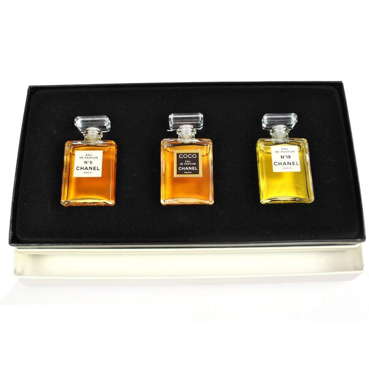 For the bonafide Chanel collector: Chanel Vintage Rare Three Piece No 5 No 19 CoCo Eau de Perfume Bottles Gift Set in Box

Includes set of three bottles
Bottles measure 1