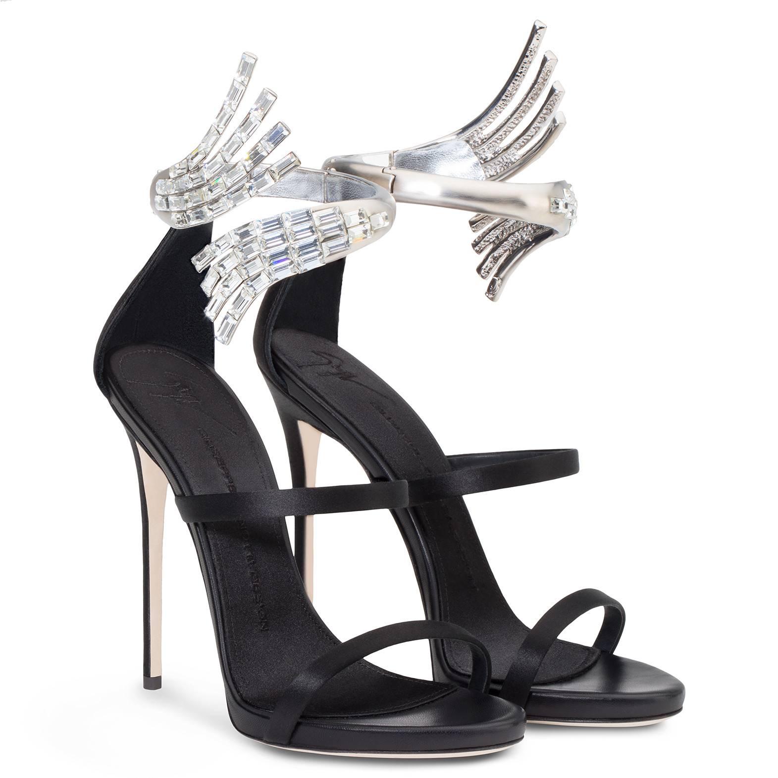 CURATOR'S NOTES

ONLY PAIR IN THIS SIZE!  Giuseppe Zanotti New Black Satin Wraparound Crystal Evening Sandals Heels in Box 

Size IT 36 - Not your size?  Message us to help you find yours.
Satin
Crystal
Heel height 4.75" (120mm) 
Made in