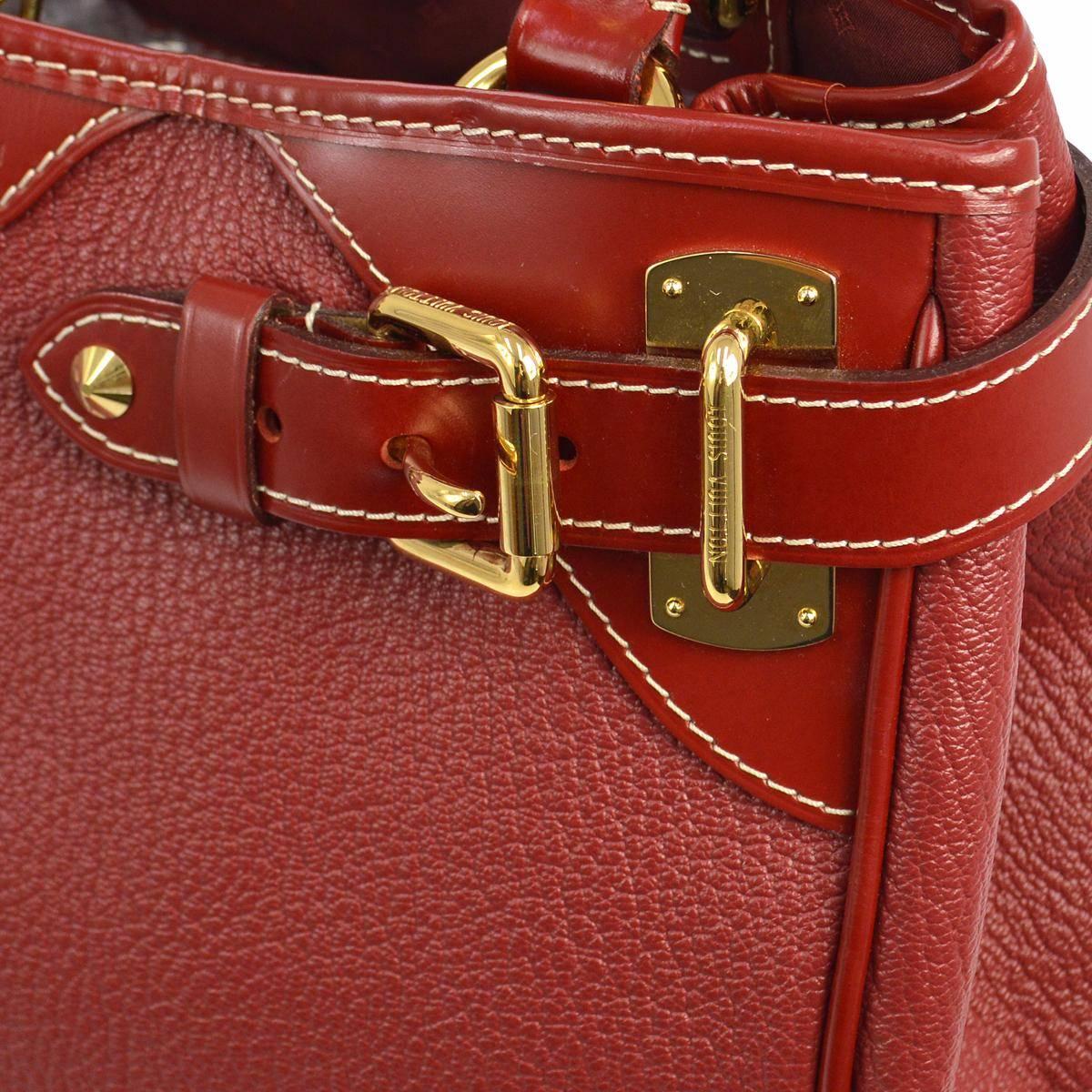 Louis Vuitton Bordeaux Red Leather Buckle Carryall Travel  Top Handle Tote Bag 

Leather
Gold tone hardware 
Twill lining
Made in France
Handle drop 8