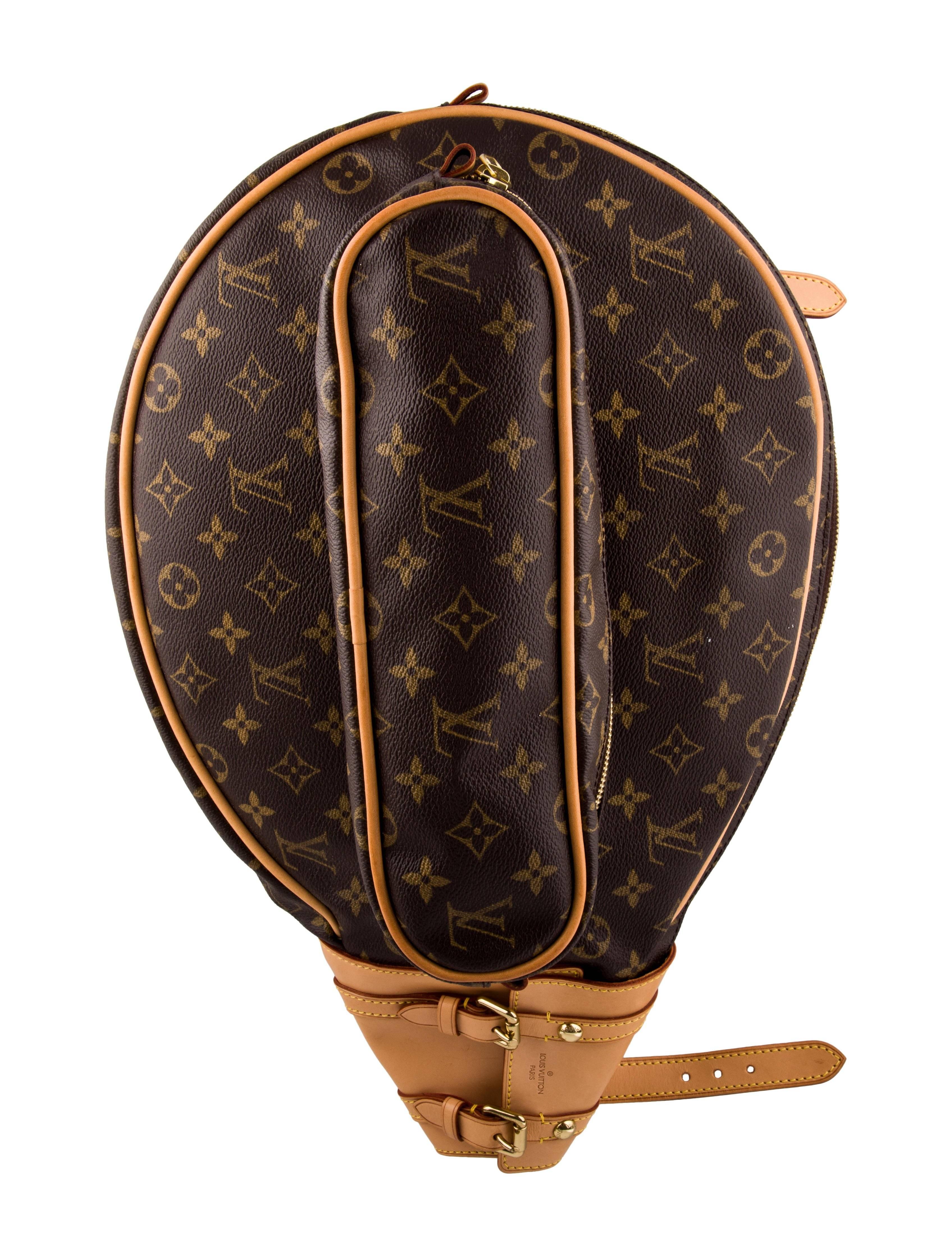 Louis Vuitton Monogram Men's Women's Tennis Racquet and Ball Storage Travel Case Bag

Monogram canvas
Leather
Gold tone hardware
Twill lining
Measures 12.5" W x 19" L x 2.25" D 