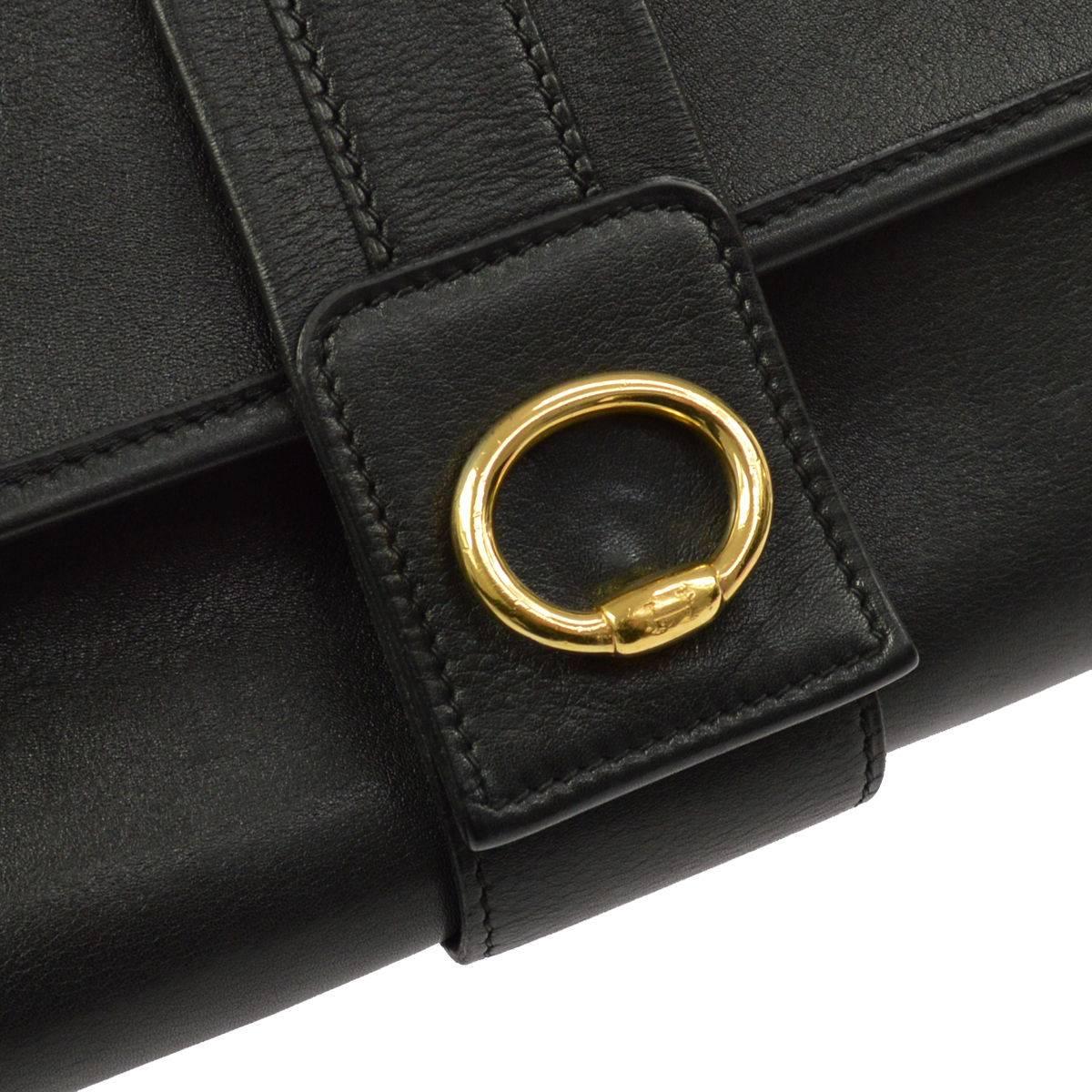 CURATOR'S NOTES

Hermes Black Leather Gold Fold Over Flap Saddle Shoulder Bag with Dust Bag  

Leather
Gold tone hardware
Magnetic flap closure
Leather lining
Made in France
Shoulder strap drop 14"
Measures 13.5" W x 8.25" H x