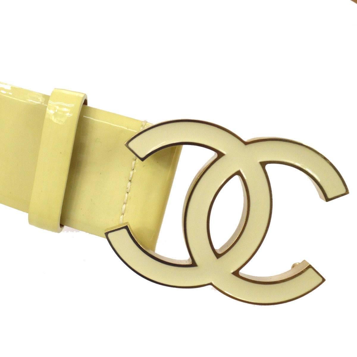 Chanel Cream Nude Gold CC Patent Leather Evening Waist Belt 

Size listed 90/36
Patent leather
Gold tone hardware
Peg closure
Made in Italy
Width 1.5