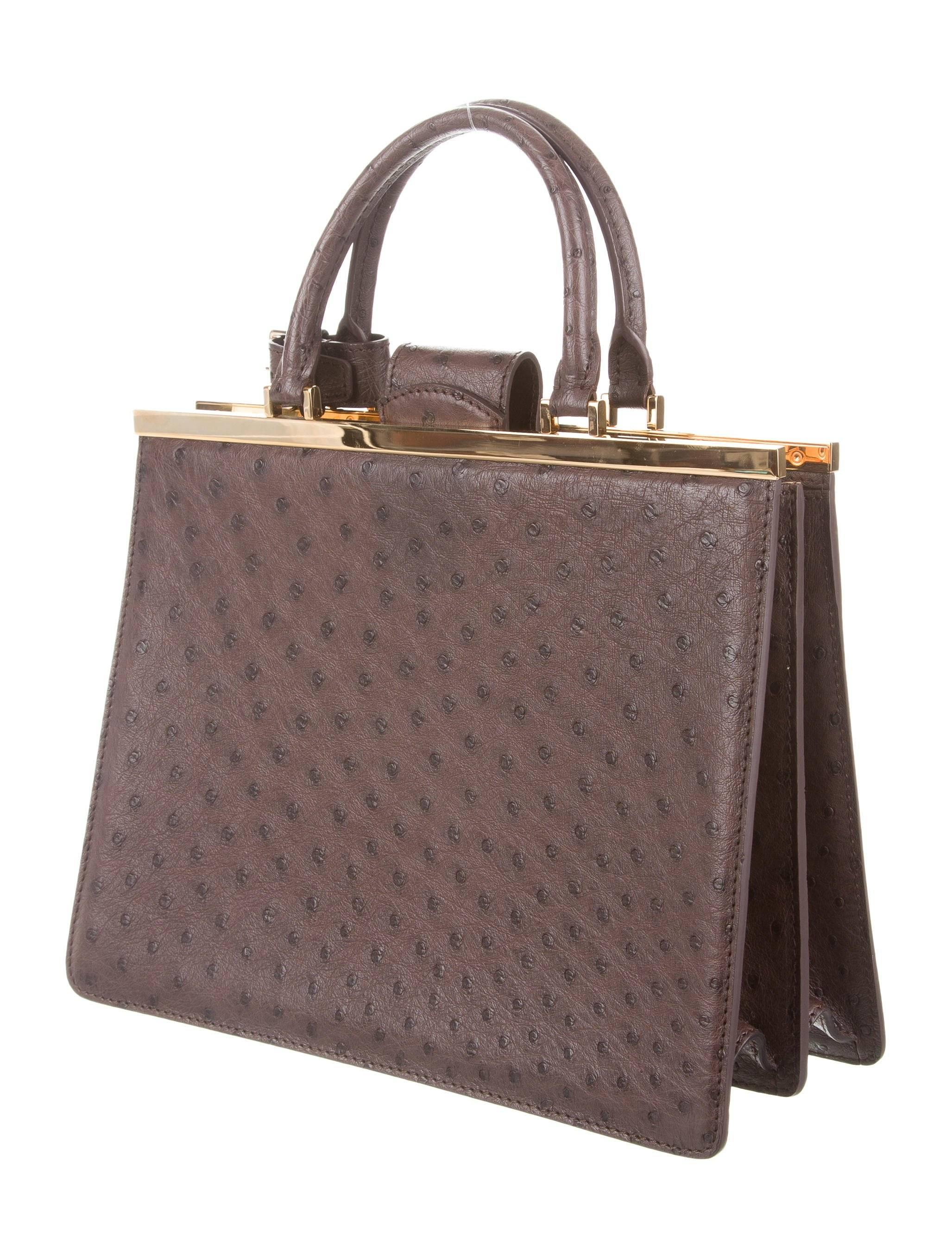 Louis Vuitton NEW Limited Edition Taupe Brown Gold Exotic Kelly Style Evening Top Handle Satchel Bag 

Original purchase price $32,500
Ostrich
Brass gold tone hardware
Leather lining
Magnetic closure 
Date code present
Handle drop 5