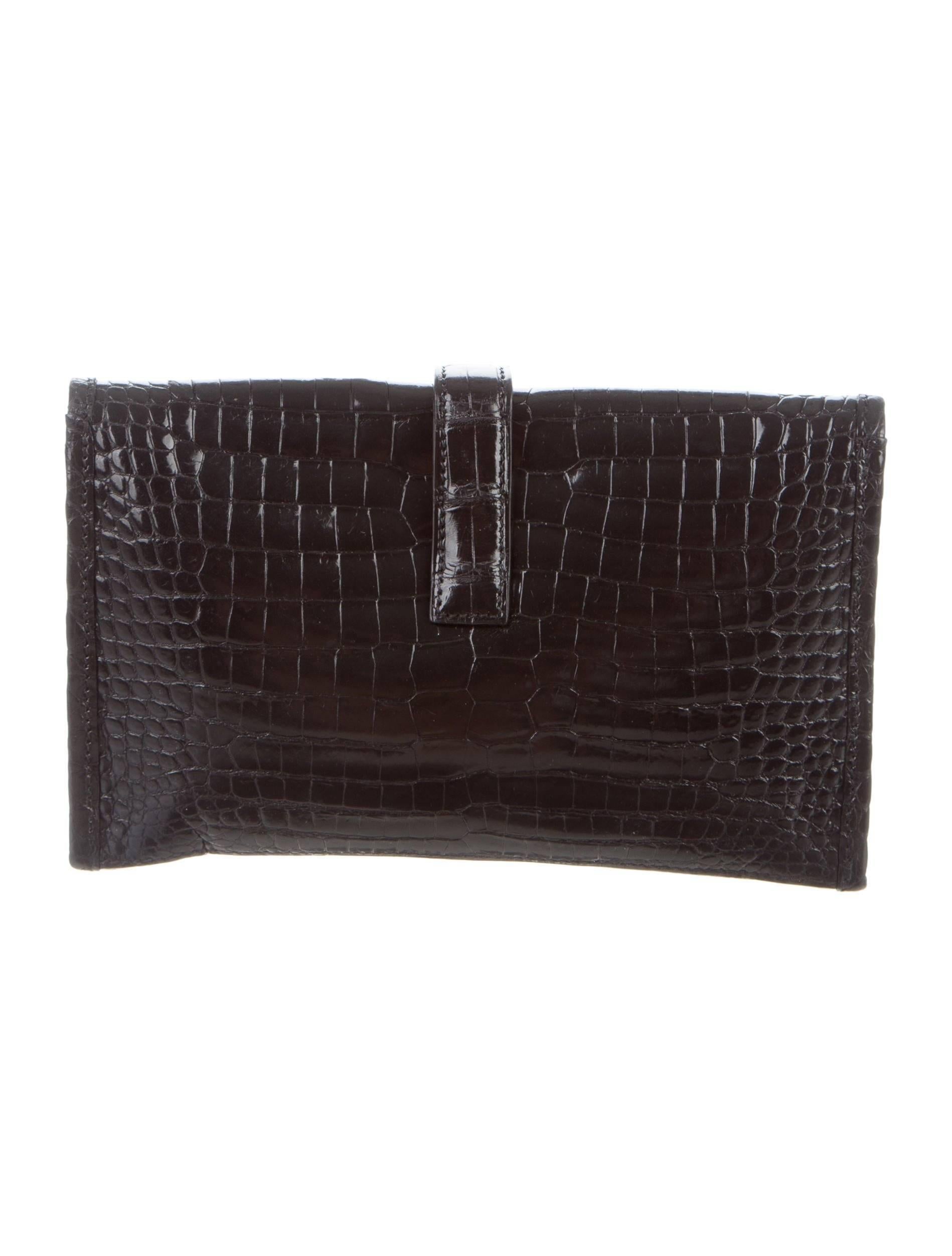 Hermes Limited Edition Black Crocodile H Small Envelope Evening Clutch Flap Bag

Crocodile 
Leather lining
Pull through closure
Made in France
Date code present Square H
Measures 8" W x 4.5" H x 0.5" D 