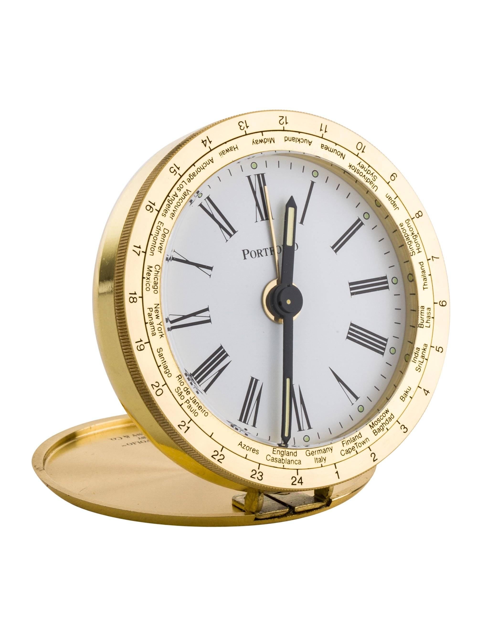 CURATOR'S NOTES

Tiffany & Co Gold Travel Decor Desk Table Alarm Clock in Box

Stainless steel
Gold tone
Signed
Quartz movement 
Alarm and time features
Includes original Tiffany & Co dust bag and box 
Diameter 2.25"
Depth 0.5"