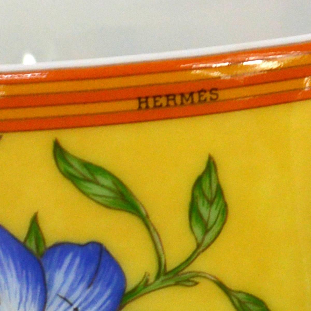 Hermes Porcelain Flower Four Piece Table Dishes Tea Set in Box

Porcelain 
Signed
Cups measure 3.25" W x 2.5" H 
Plates diameter 6"
Includes original Hermes box