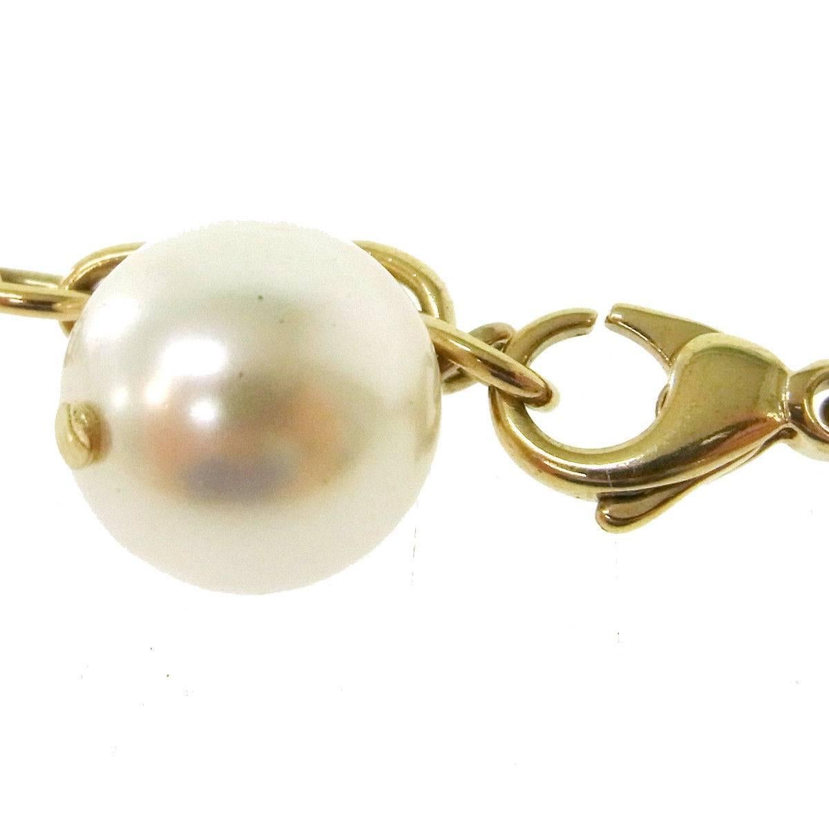 Chanel Gold Pearl Charm Chain Link Drape Drop Evening Pendant Necklace In Excellent Condition In Chicago, IL