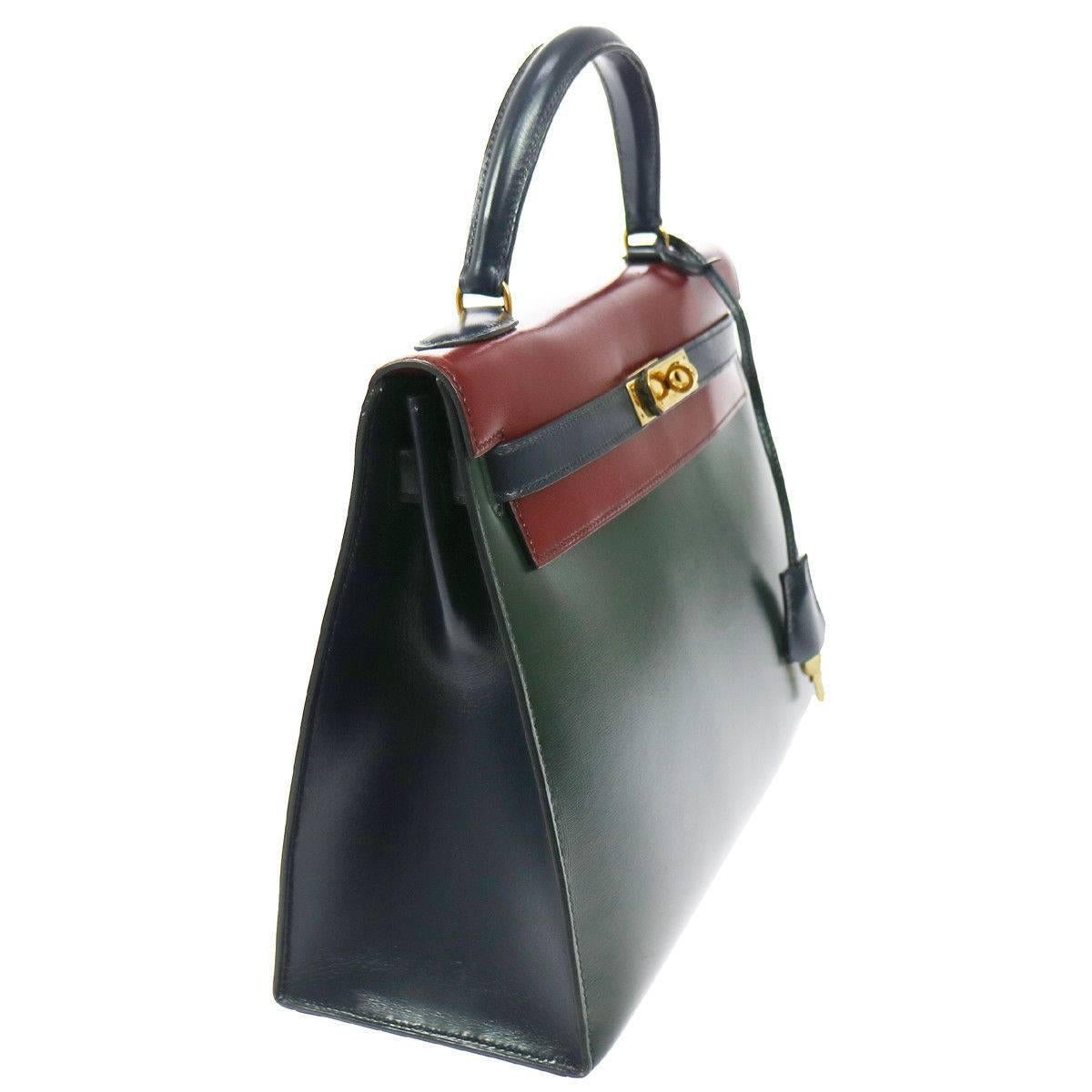 Hermes Kelly 32 Sellier Bordeaux Green Blue Leather Top Handle Satchel Flap Bag

Leather 
Leather lining
Gold tone hardware
Date code Circle S
Made in France
Handle drop 4"
Measures 12.5" W x 9.5" H x 4.75" D
Includes original