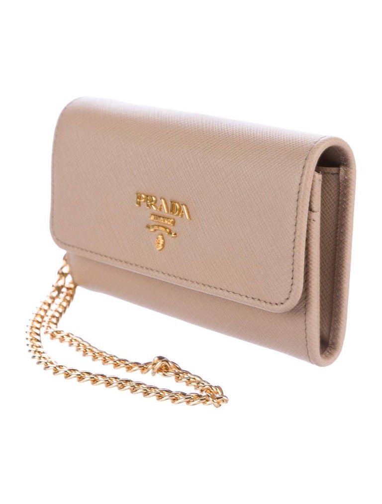 gold prada clutch