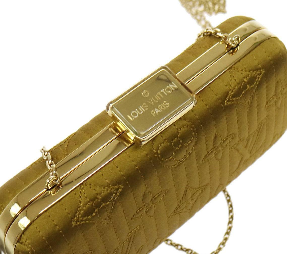 Louis Vuitton Monogram Satin 2 in 1 Evening Clutch Flap Chain Shoulder Bag

Satin
Gold tone hardware
Leather lining
Twist lock closure
Date code present
Made in Italy
Shoulder strap drop 24"
Measures 6.75" W x 4" H x 2" D 
