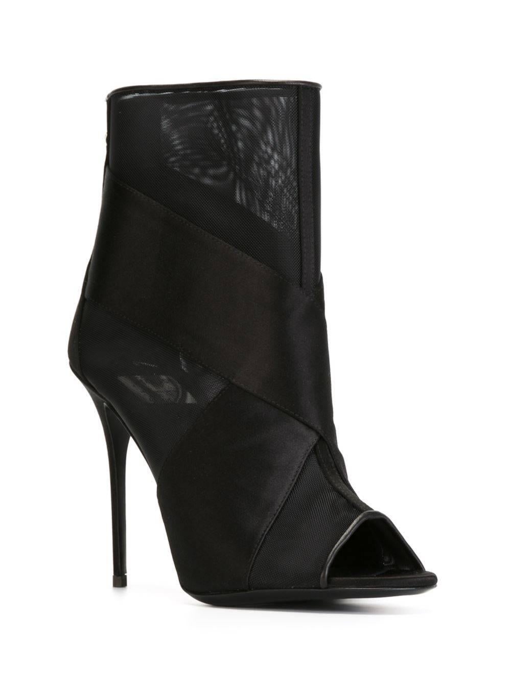 Giuseppe Zanotti New Black See Through Cut Out Ankle Boots Booties in Box

Size IT 36
Suede
Mesh
Zipper closure
Made in Italy
Heel height 4.25"
Includes original Giuseppe Zanotti box
