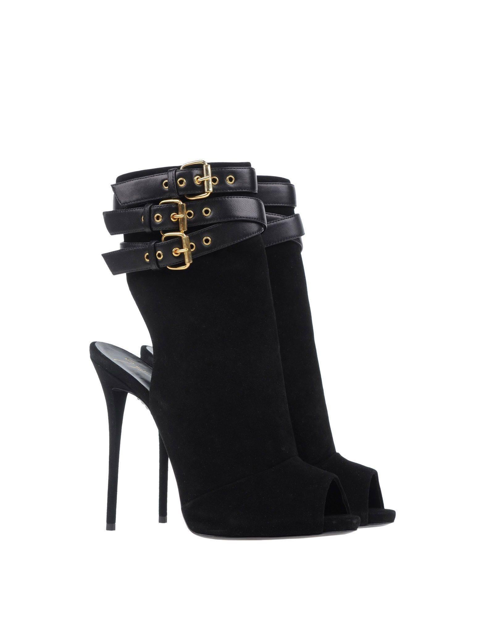 Giuseppe Zanotti New Black Suede Leather Buckle Ankle Boots Booties in Box

Size IT 36
Suede
Leather
Gold tone hardware
Buckle closure
Made in Italy
Heel height 5.25"
Includes original Giuseppe Zanotti box