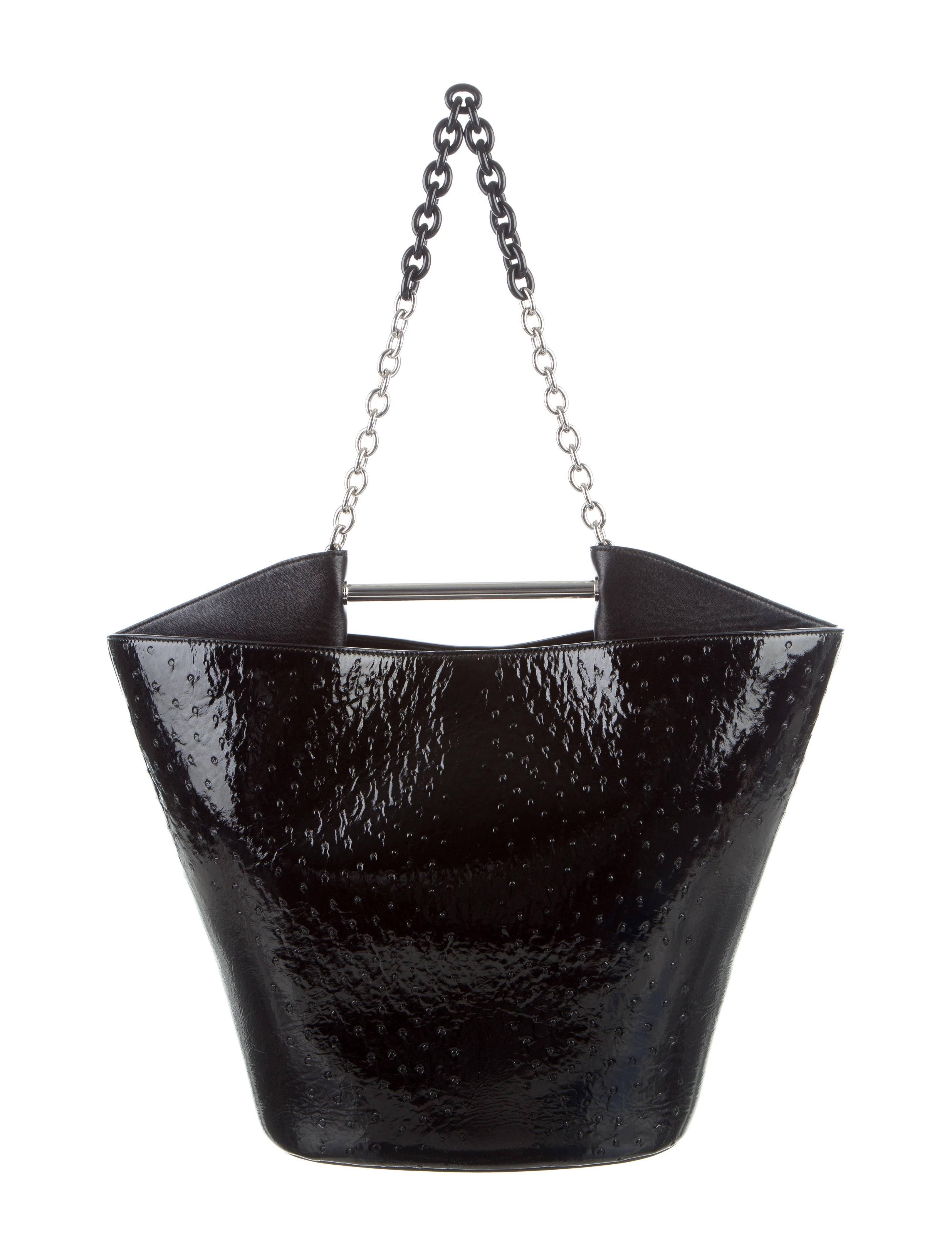 Balanciaga New Black Ostrich Exotic Skin Chain Carryall Top Handle Shoulder Bag

Original purchase price $5,995
Ostrich
Silver tone hardware
Leather lining
Made in Italy
Top handle drop 3"
Shoulder strap drop 11"
Measures 20" W x