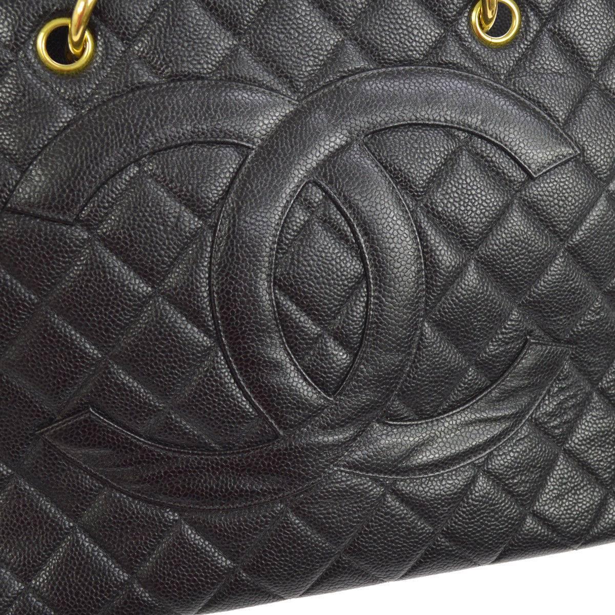 Chanel Black Caviar Leather Carryall Travel Top Handle Shoulder Tote Bag

Leather
Gold tone hardware
Leather lining
Date code present
Made in France
Handle drop 6"
Measures 12.75" W x 9.5" H x 6.75" D 