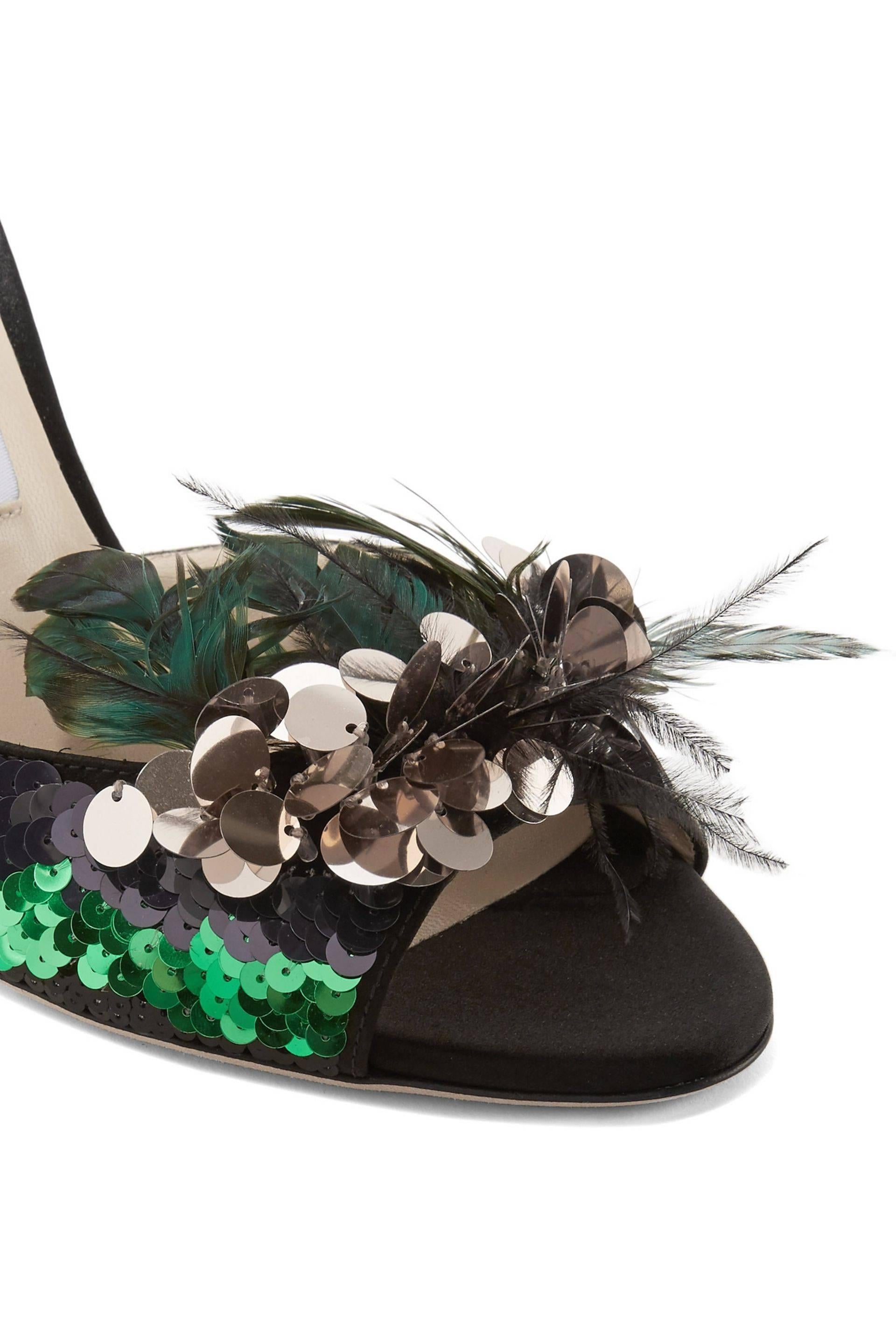 Jimmy Choo New Black Green Ostrich Sequin Evening Sandals Heels in Box

Size IT 36
Satin
Ostrich
Sequin
Ankle buckle closure
Made in Italy
Heel height 4"
Includes original Jimmy Choo box