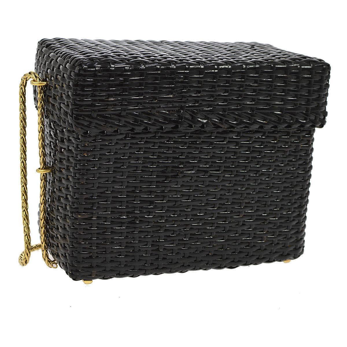 Chanel Rare Black Wicker Picnic Lunch Box Evening Shoulder Bag

Wicker
Metal
Gold tone hardware
Leather lining
Date code present
Made in Italy
Shoulder strap drop 16"
Measures 7" W x 6" H x 3.25" D 
