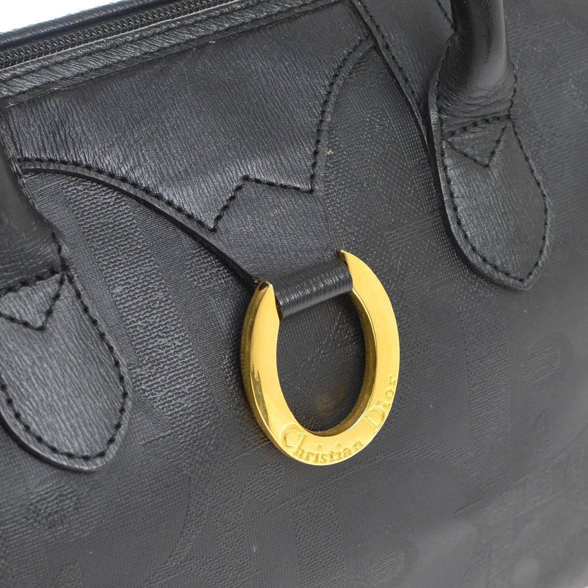 Christian Dior Black Monogram Canvas Logo Satchel Speedy Top Handle Bag

Monogram canvas
Leather trim
Gold tone hardware
Zipper closure
Woven lining 
Made in France
Handle drop 3.5