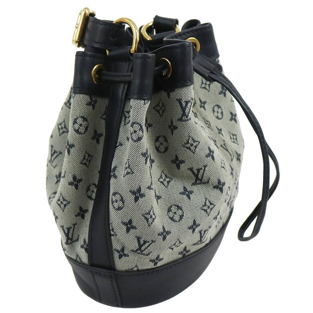 Louis Vuitton Noe Denim Monogram Blue Leather Carryall Bucket Shoulder Bag

Monogram fabric
Leather
Drawstring closure 
Date code present
Made in France
Shoulder drop  drop 6