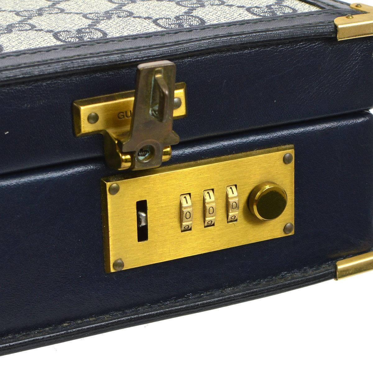 Gucci GG Monogram Blue Top Handle Satchel Men's Women's Business Briefcase Bag

Monogram canvas
Gold tone hardware 
Leather lining
Made in Italy
Handle drop 1.5