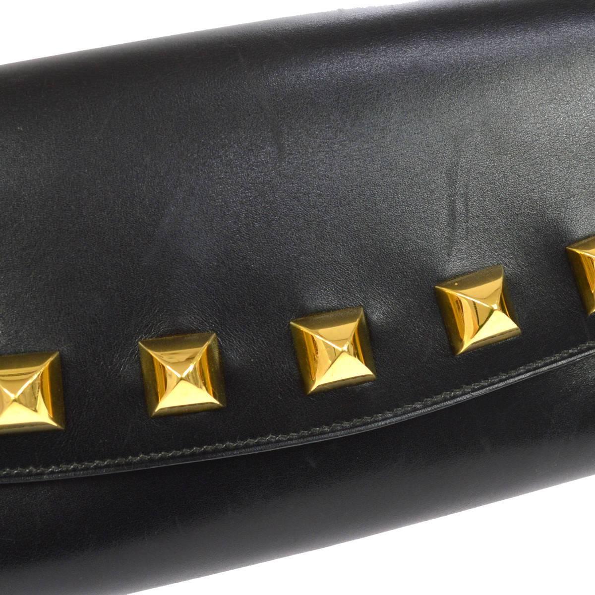 gold studded clutch