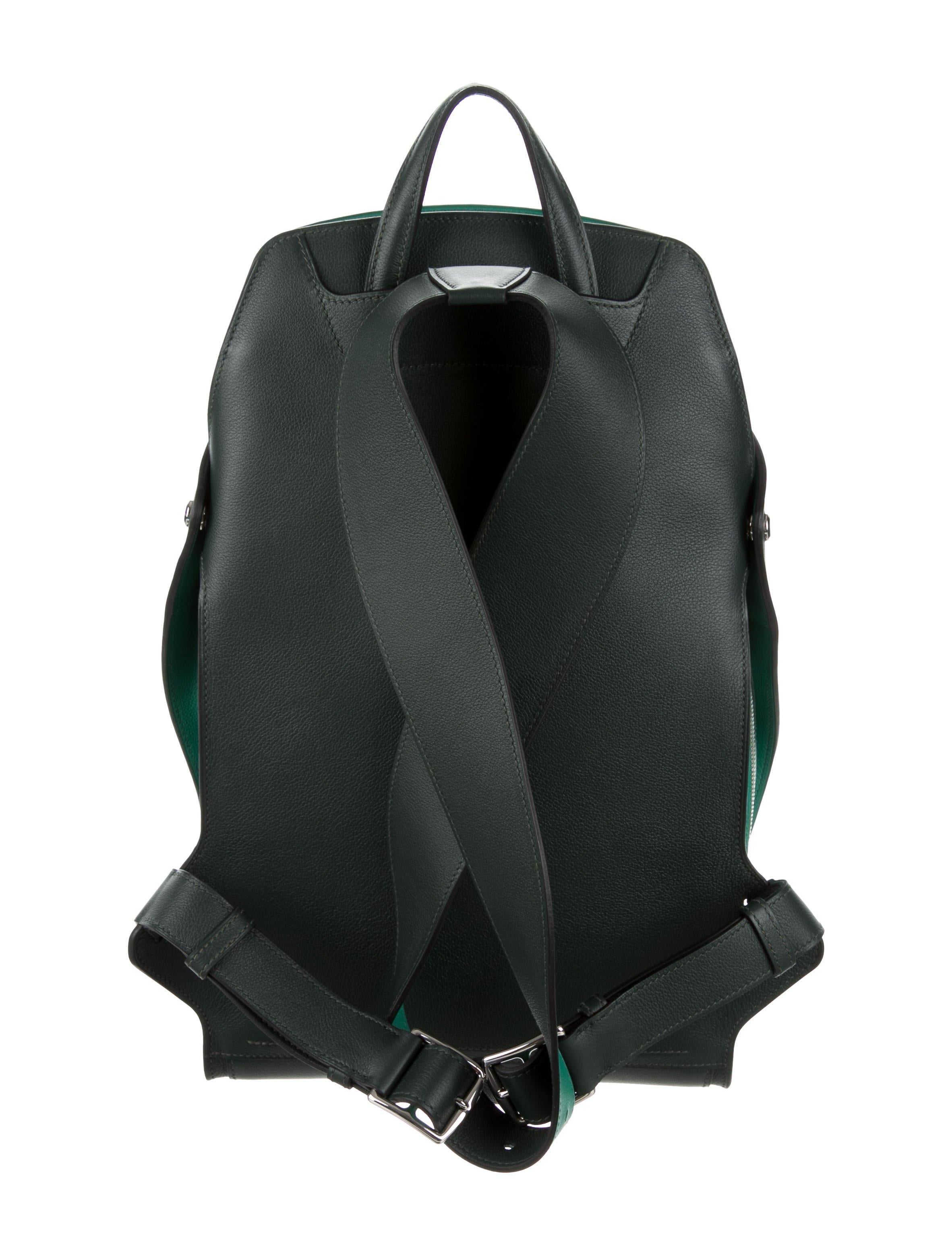 Hermes Black Green Leather Men's Women's Top Handle Backpack Travel Shoulder Bag in Box

Leather 
Palladium hardware
Woven lining
Zipper closure
Date code present
Made in France
Handle drop 2