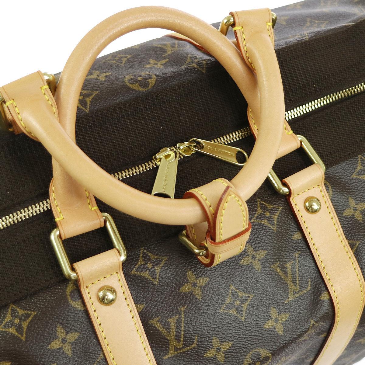 Louis Vuitton Monogram Large Men's Women's Travel Carryall Duffle Top Handle Bag

Monogram canvas
Leather trim
Gold tone hardware
Zipper closure
Made in France
Date code present
Handle drop 4.25