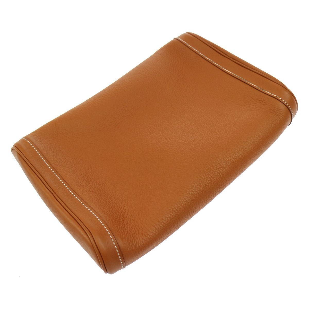 Hermes Cognac Leather Toiletry Travel Vanity Travel Evening Clutch Bag in Box

Leather
Gold tone hardware
Woven lining 
Made in France
Measures 10.5