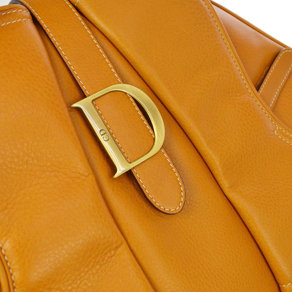 Christian Dior Cognac Leather Gold 'D' Charm Buckle Top Handle Satchel Bag

Leather
Gold tone hardware
Woven lining
Made in Italy
Handle drop 4