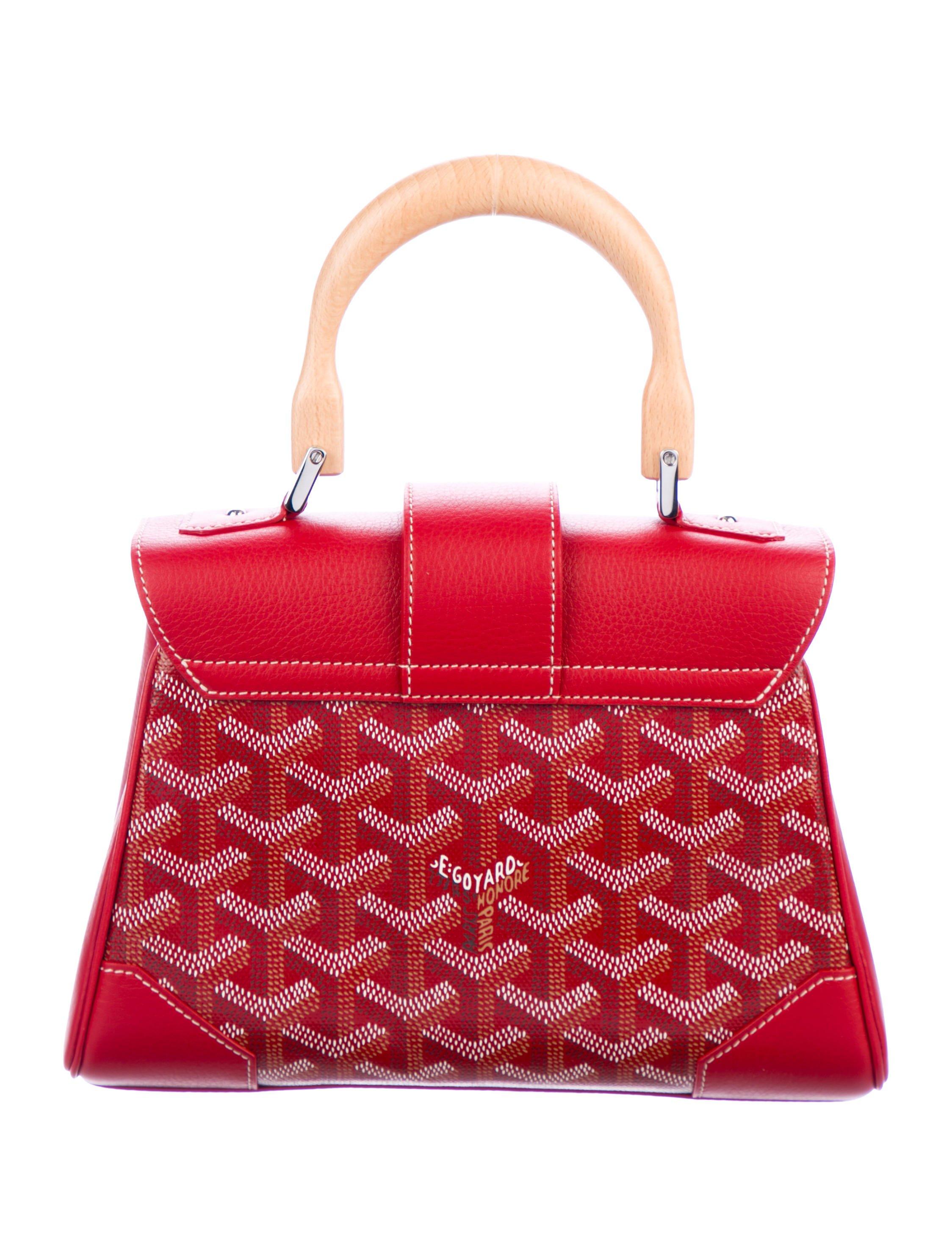 Goyard NEW Red Monogram Logo Leather Kelly Style Top Handle Satchel Bag in Box

Monogram canvas
Leather
Wood
Silver tone hardware 
Woven lining
Flap closure
Made in France
Handle drop 3