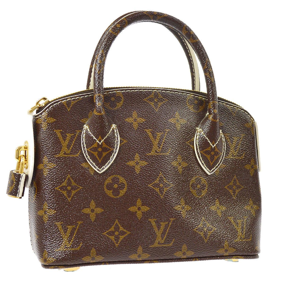 Louis Vuitton Monogram Canvas Evening Small Top Handle Satchel Bag

Monogram canvas
Leather
Gold tone hardware
Date code present
Made in France
Handle drop 3