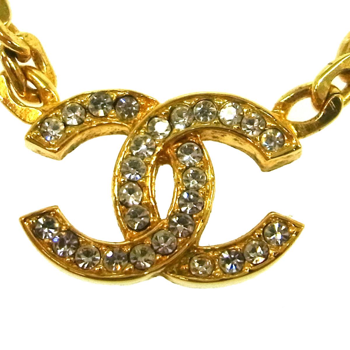Chanel Gold Chain Link Rhinestone Charm Evening Necklace in Box

Metal
Rhinestone
Gold tone
Lobster claw closure
Made in France
Charm diameter ~1