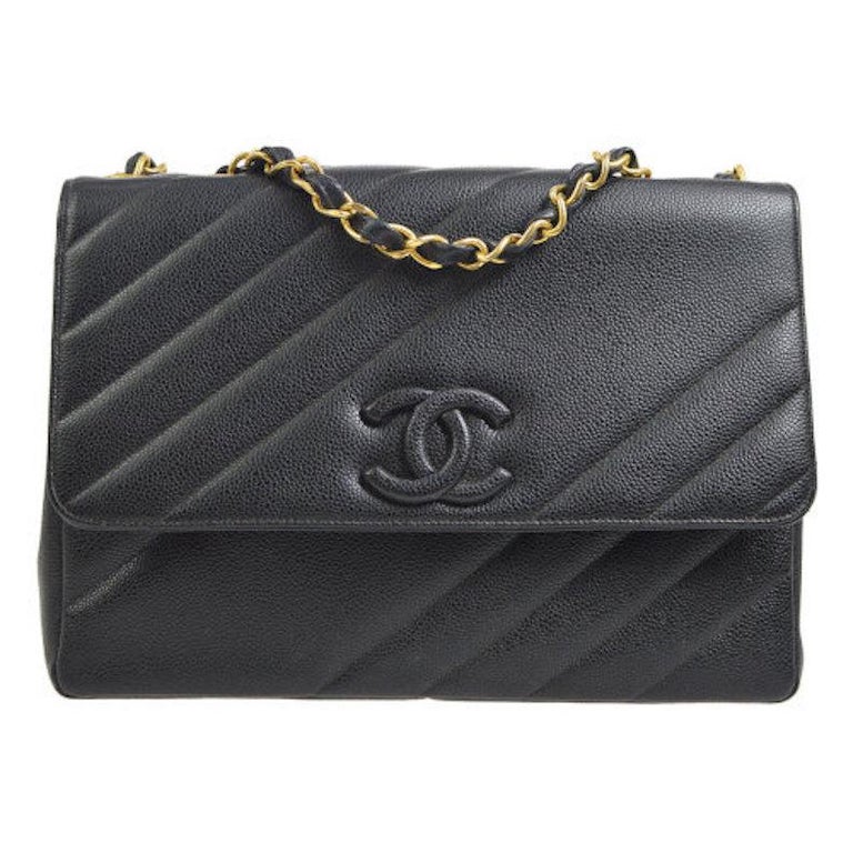  CC logo flap shoulder bag in black leather, late 20th century, offered by Newfound Luxury