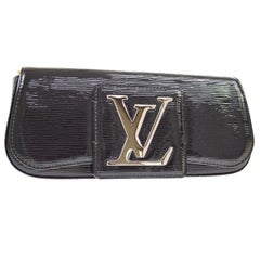 Louis Vuitton Limited Edition Black Logo Gold Chain Shoulder Clutch Bag at 1stdibs