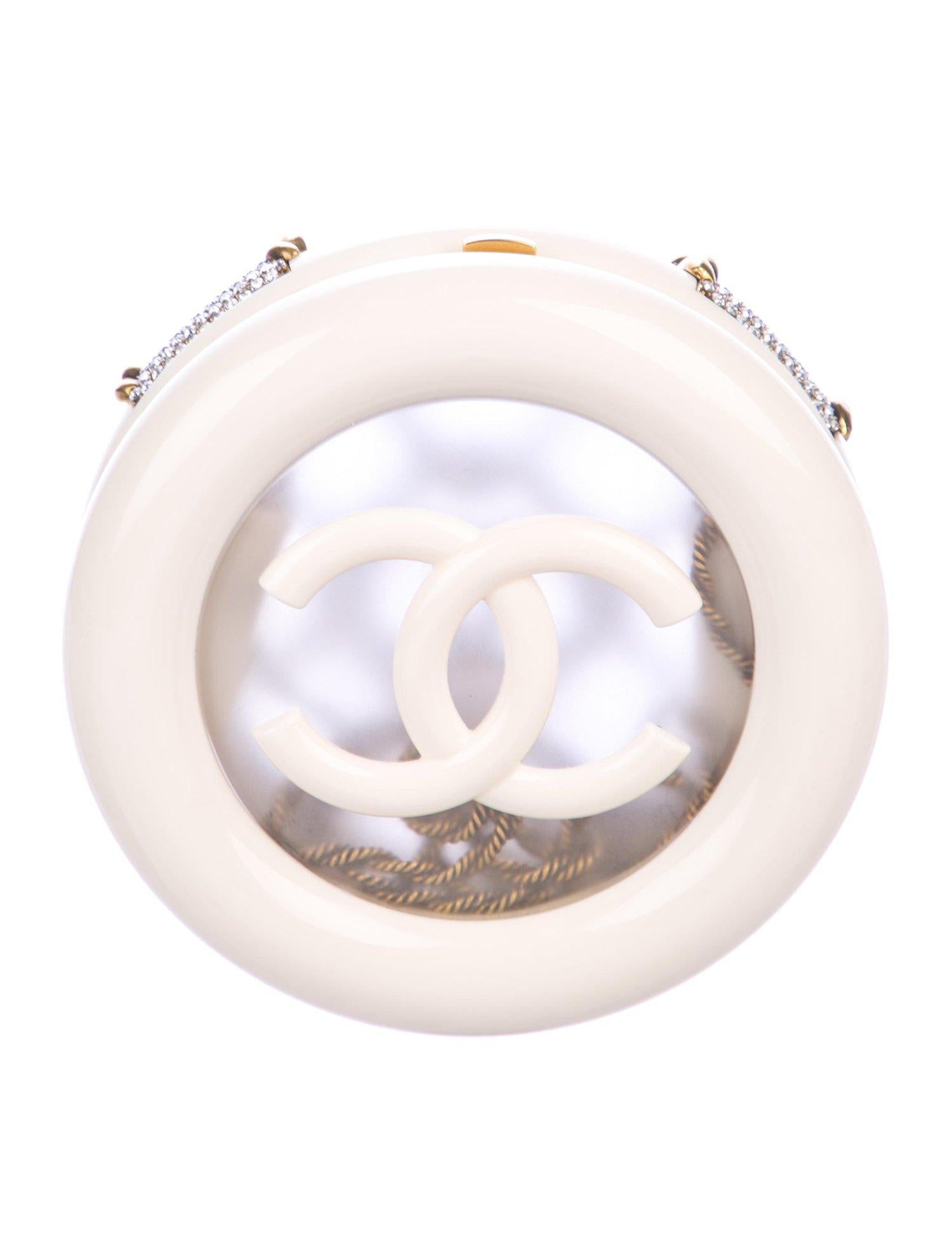 Chanel NEW Limited Edition Ivory Crystal Round CC Mini 2 in 1 Clutch Evening Shoulder Bag in Box

Resin
Crystal
Leather
Metal
Gold tone hardware
Acrylic and leather interior 
Push lock closure 
Date code present
Made in France
Shoulder strap drop