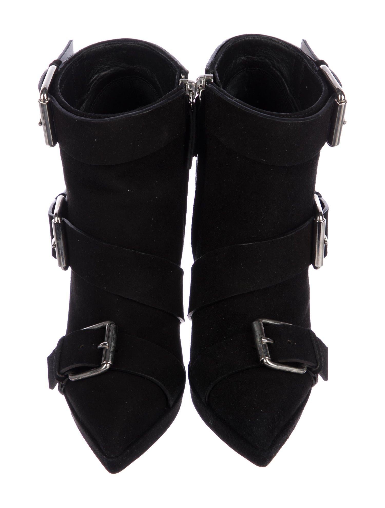 Giuseppe Zanotti NEW Black Suede Silver Biker Buckle Ankle Boots Booties in Box

Size IT 36
Suede
Silver tone hardware
Buckle and zip closures
Made in Italy
Heel height 4.5