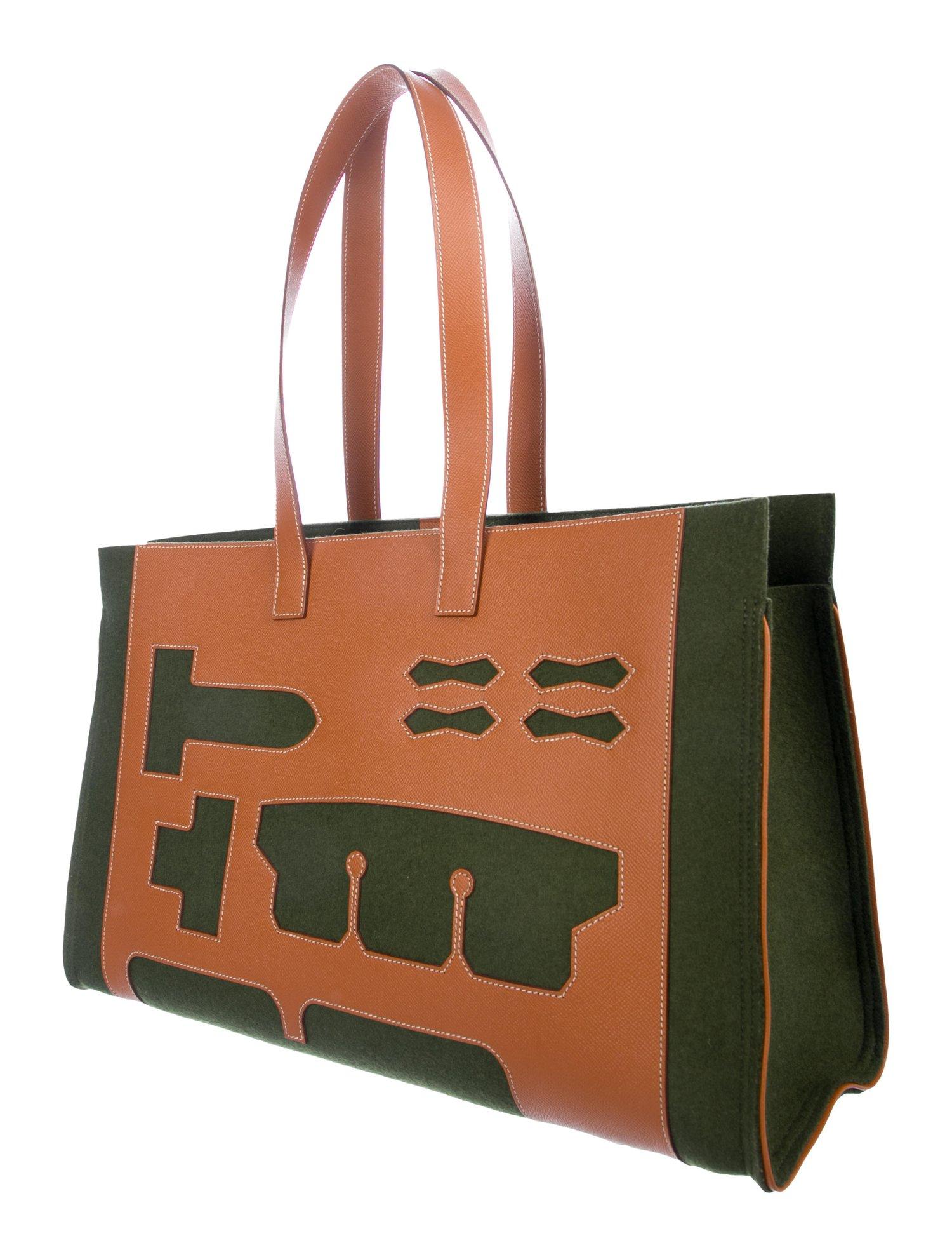 Hermes Green Cognac Tan Wool Top Handle Satchel Carryall Top Handle Tote Bag

Wool 
Leather trim
Wool interior
Made in France
Shoulder strap drop 10