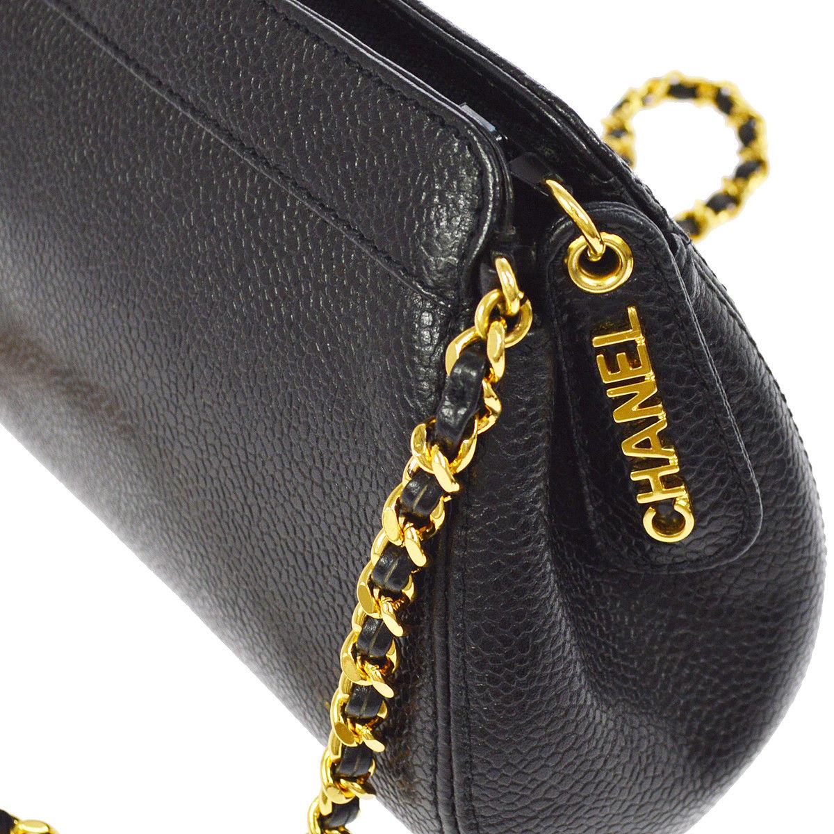 Chanel Black Caviar Leather Gold Mini 2 in 1 Clutch Party Shoulder Bag

Caviar
Gold tone hardware
Leather lining
Zipper closure
Made in Italy
Date code present
Shoulder strap drop 23