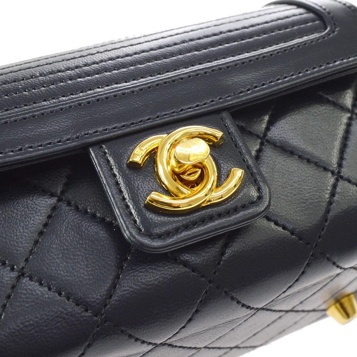 Chanel Rare Midnight Navy Blue Leather Gold Top Handle Satchel Mini Evening Bag

Leather
Gold tone hardware
Leather lining
Date code present
Made in France
Handle drop 3