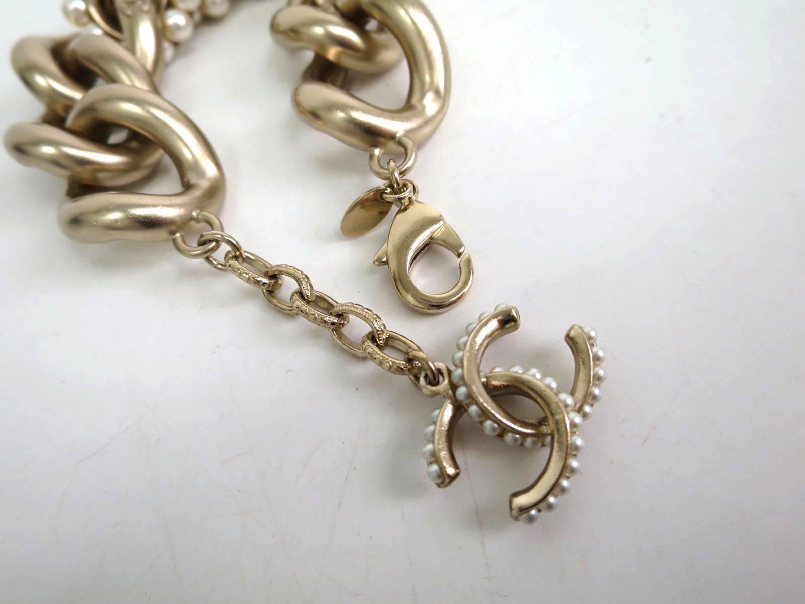 Chanel Pearl Gold Chain Link Charm Bracelet In Excellent Condition In Chicago, IL