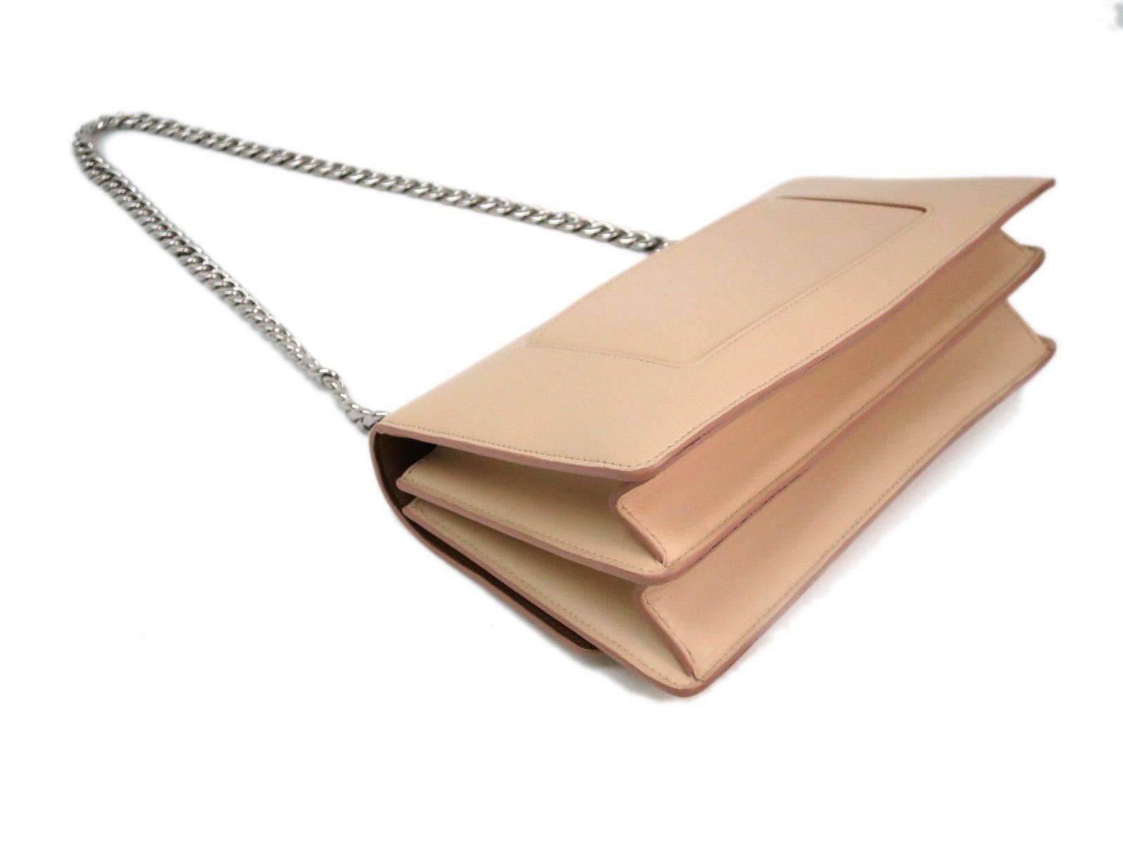 beige bag with silver chain