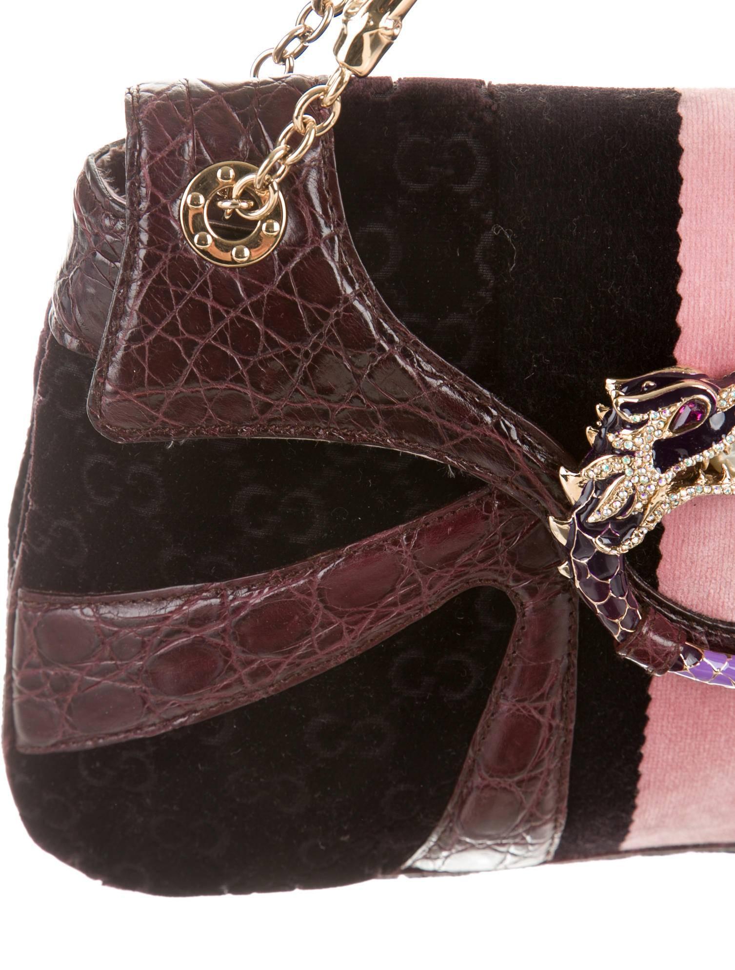 CURATOR'S NOTES

WOW! LIMITED TIME PRICE REDUCTION!

Amazing limited edition and rare Gucci velvet, crocodile and crystal flap chain shoulder bag.  Hailing from the Tom Ford for Gucci era, this amazing bag boasts  a crystal-encrusted dragon