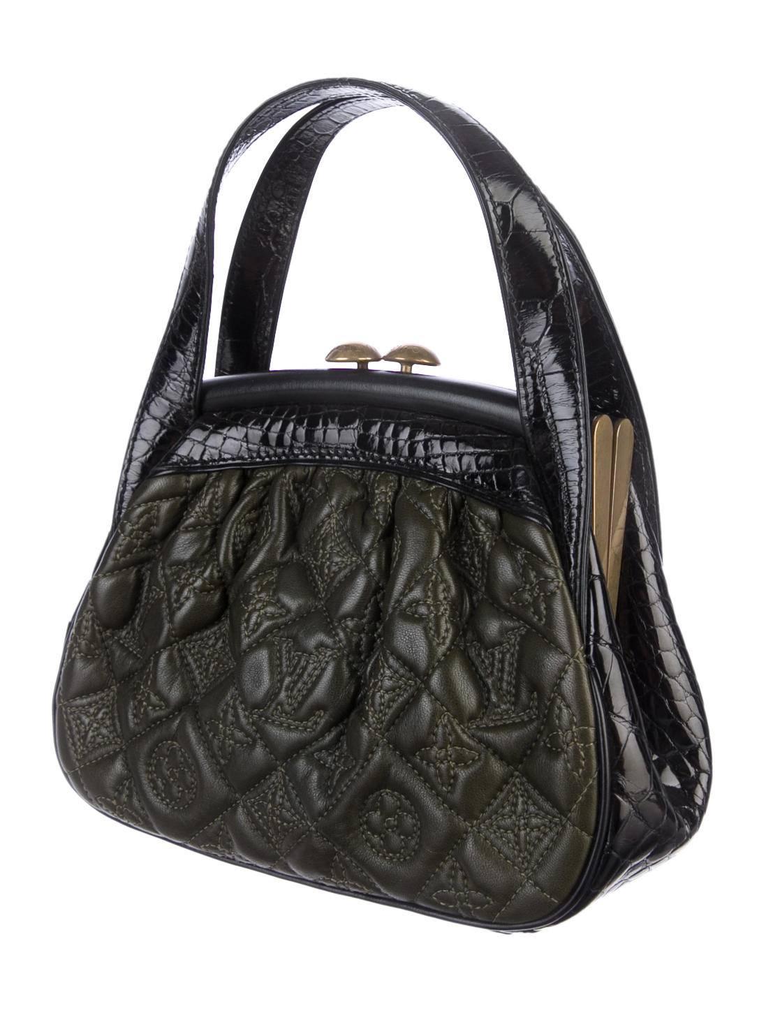 CURATOR'S NOTES

Only Louis Vuitton can take a lady-like top handle satchel to the next level like this!  Featuring monogram leather and alligator trim, this kiss-lock closure bag will easily become your favorite go-to evening bag.

Retail price