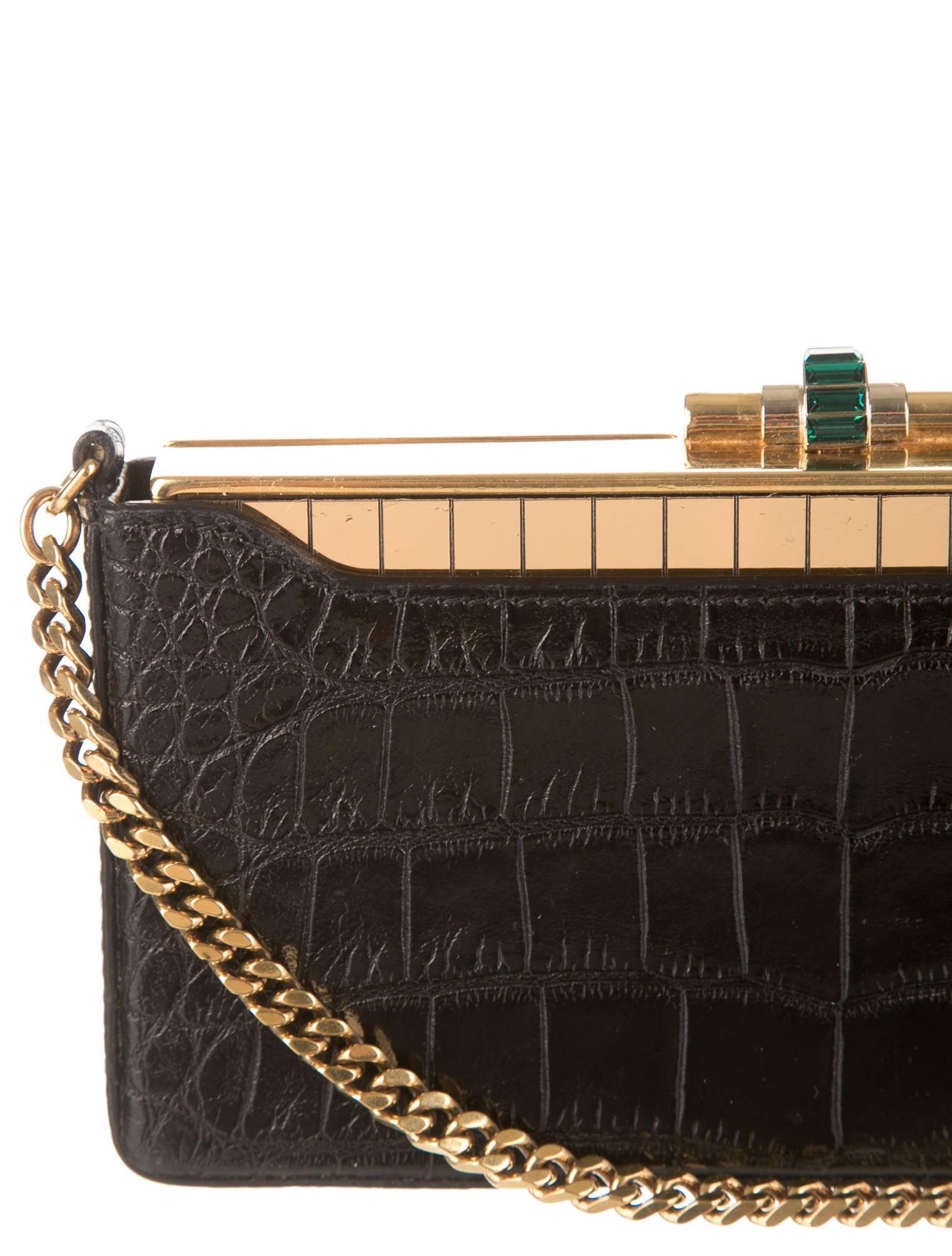 CURATOR'S NOTES

INCREDIBLE price reduction for a limited time only!

The mother of luxury evening bags!  Stunning Gucci crocodile and gold evening clutch shoulder bag.  Fit for a queen heavy on the social scene.

Retail Price