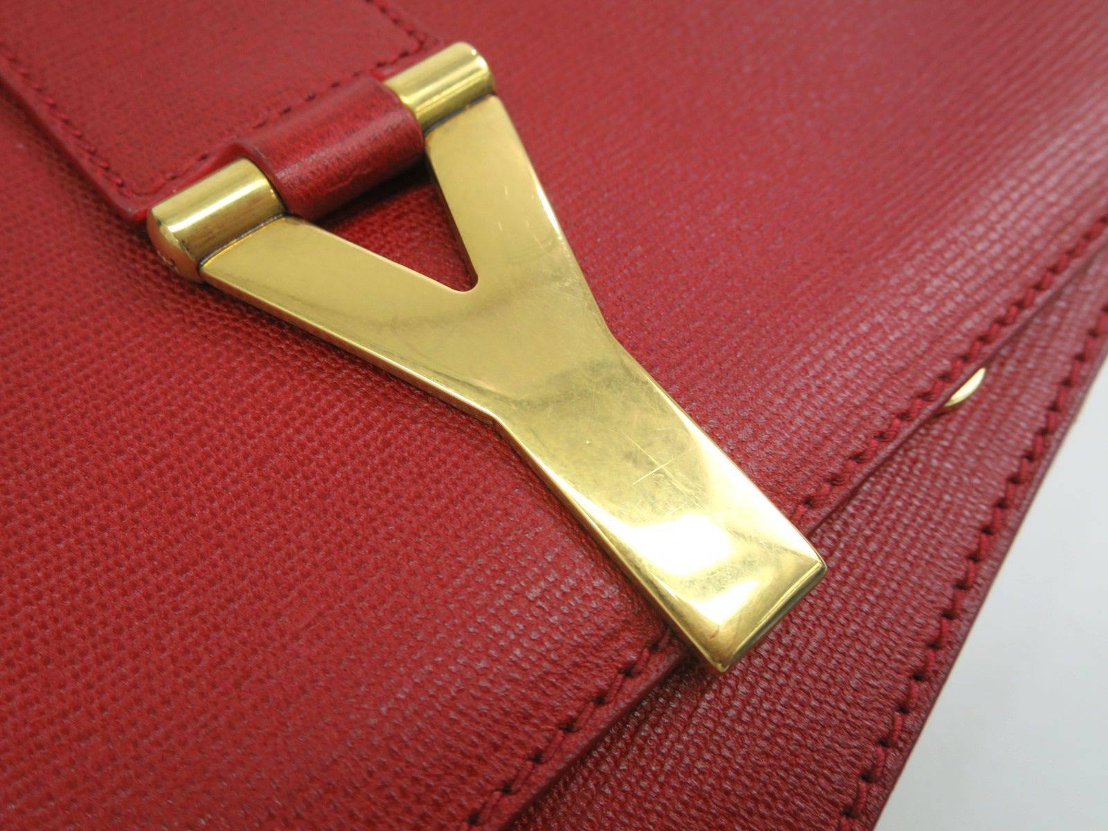 CURATOR'S NOTES

Chic, indeed! This stunning red Yves Saint Laurent Chyc Y shoulder bag features gold hardware, adjustable strap and statement Y flap.  

Style Tip: Wear it crossbody style with your favorite boyfriend jeans and blazer, or clutch
