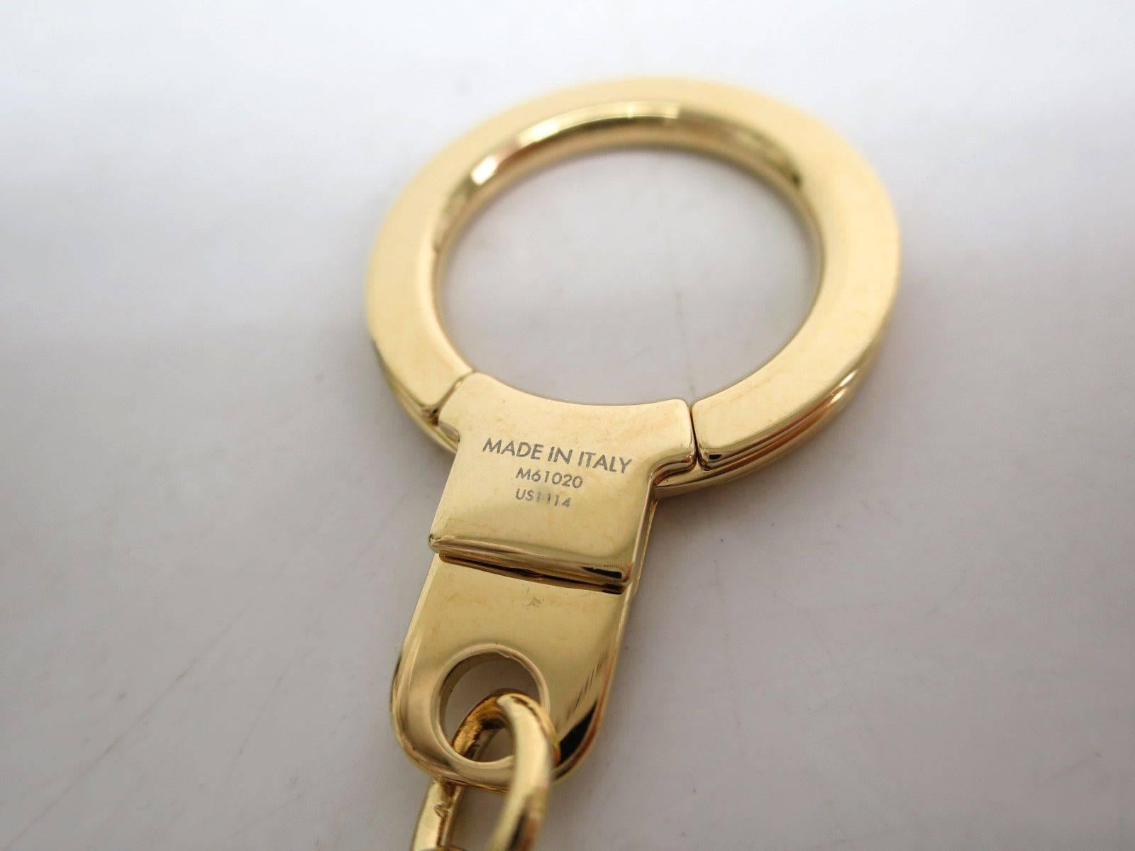 Louis Vuitton Gold Tone Logo Key Bag Charm Chain In Good Condition In Chicago, IL