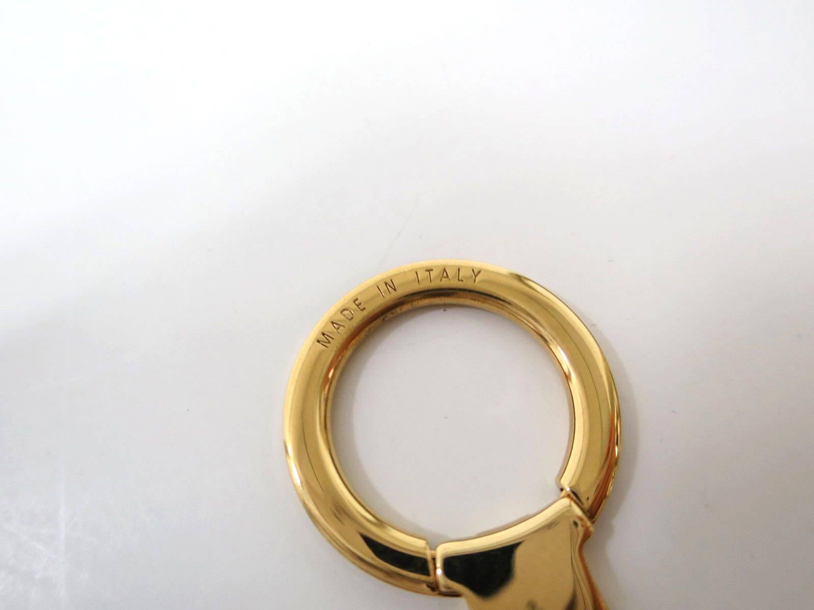 Women's Louis Vuitton Gold Tone Logo Lock Key Bag Charm Chain